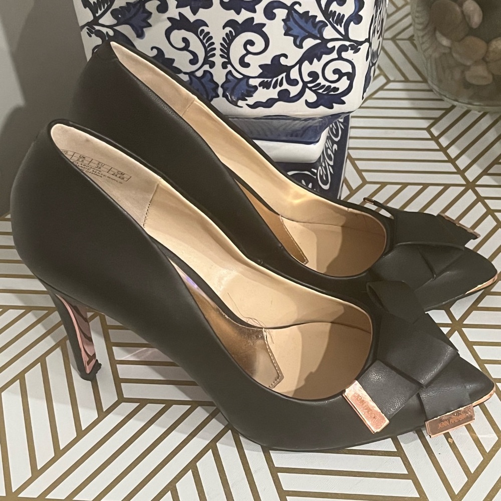 Black 4 inch heels with gold details